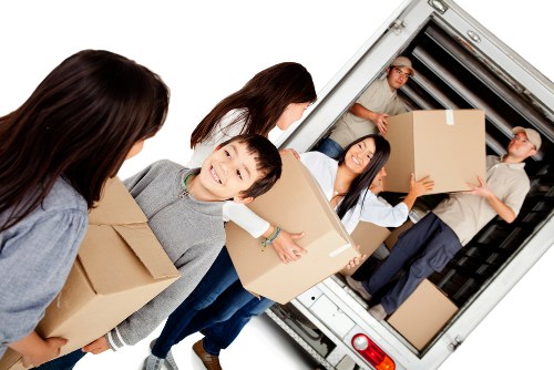 Packed boxes and wrapped furniture ready for transport