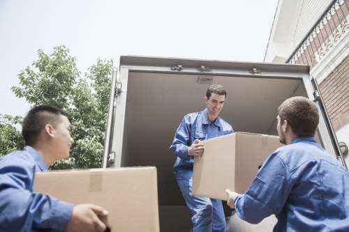 Packed boxes and furniture ready for local removals in East London