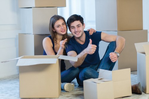 Customer confirming a removals booking with moving paperwork
