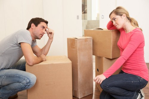 Office removal team managing desks and equipment in East London