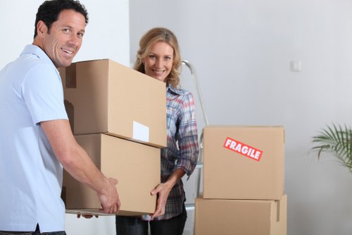 Organised office relocation with labelled boxes and furniture