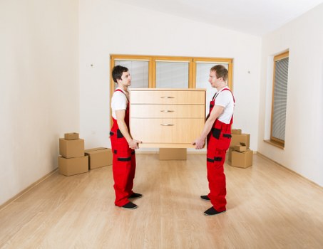 Careful furniture delivery and unloading at an East London property